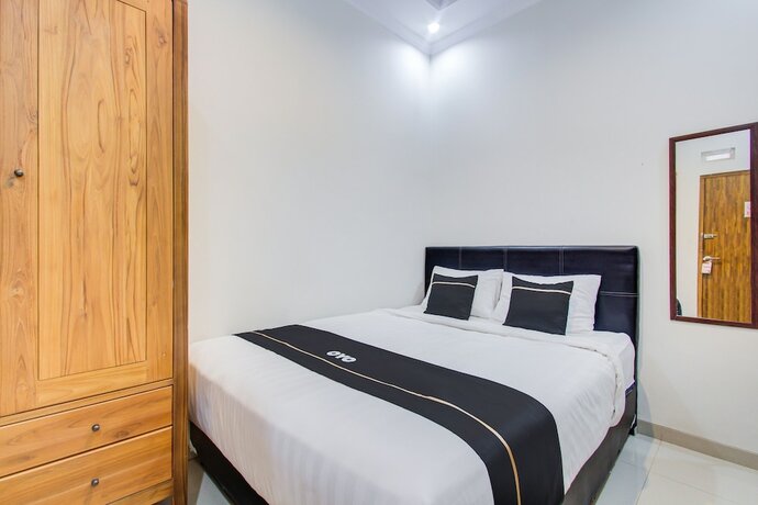 Imagen de la habitación del Hotel Super OYO Collection O 3280 Cendhani Raras. Foto 18