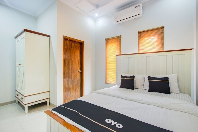 Imagen de la habitación del Hotel Super OYO Collection O 3280 Cendhani Raras. Foto 19
