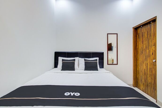 Imagen de la habitación del Hotel Super OYO Collection O 3280 Cendhani Raras. Foto 20