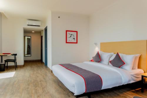 Imagen de la habitación del Hotel Super OYO Townhouse 2 Hotel Gunung Sahari. Foto 19
