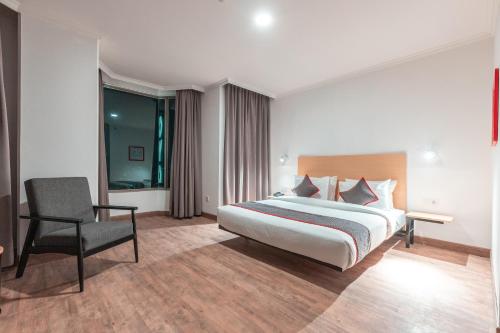 Imagen de la habitación del Hotel Super OYO Townhouse 2 Hotel Gunung Sahari. Foto 20
