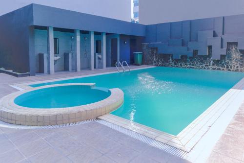 Imagen general del Hotel Super OYO Townhouse 2 Hotel Gunung Sahari. Foto 11