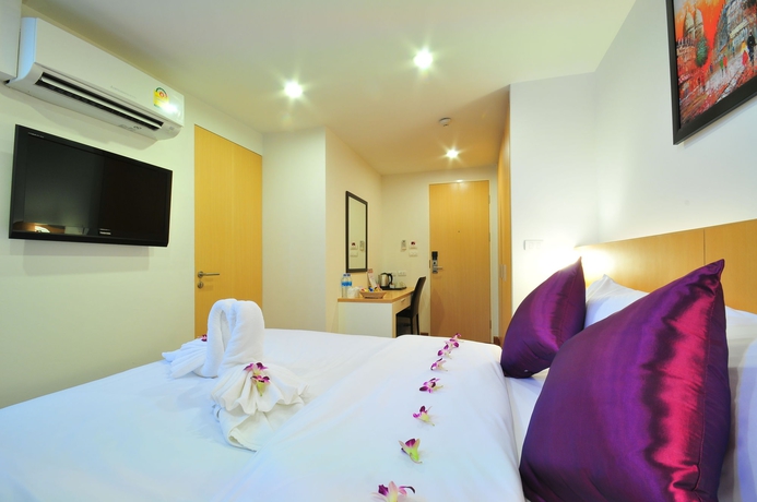 Imagen de la habitación del Hotel Super Oyo 75385 Win Long. Foto 6