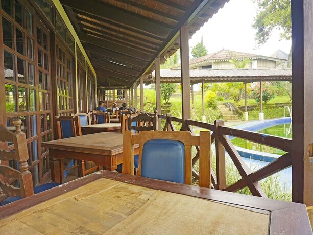 Imagen del bar/restaurante del Hotel Super Oyo 91244 Lembah Nyiur. Foto 14