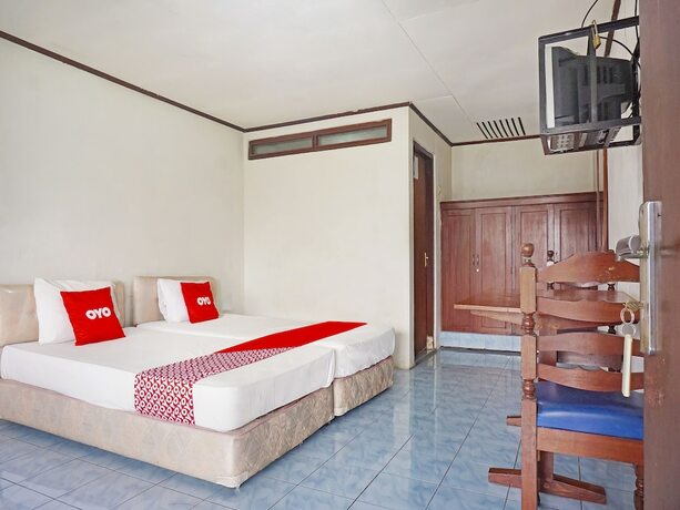 Imagen de la habitación del Hotel Super Oyo 91244 Lembah Nyiur. Foto 15