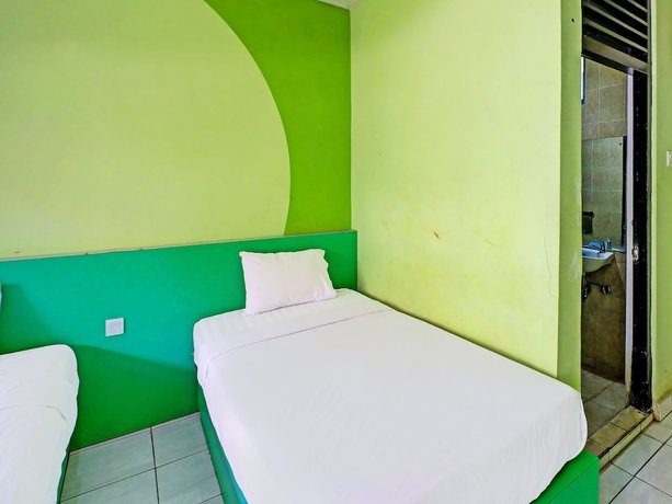 Imagen de la habitación del Hotel Super Oyo 91870 Warna Kedaton. Foto 6