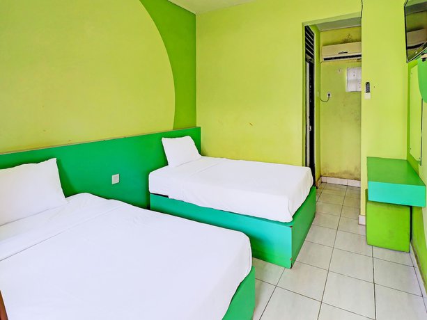 Imagen de la habitación del Hotel Super Oyo 91870 Warna Kedaton. Foto 11