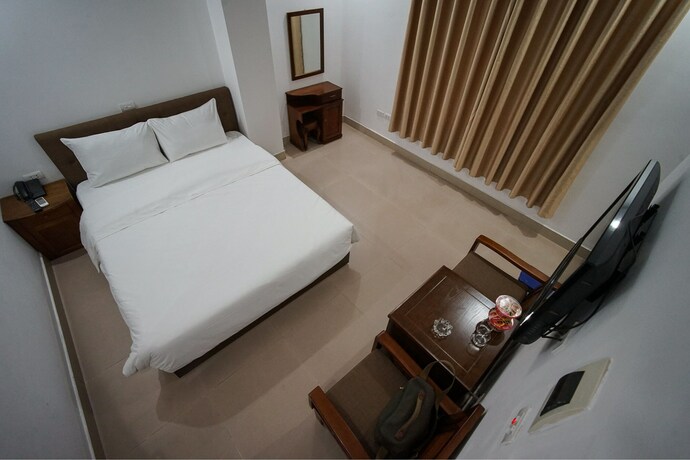 Imagen de la habitación del Hotel Super Oyo Capital O 387 Bach Duong. Foto 14
