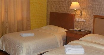 Imagen general del Hotel Super Oyo Capital O 90125 Grand Orchard. Foto 6