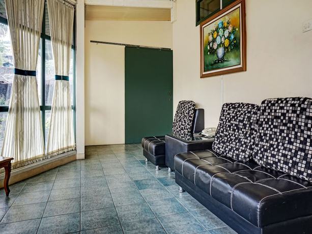 Imagen de la habitación del Hotel Super Oyo Capital O 90596 Griya Astoeti. Foto 7