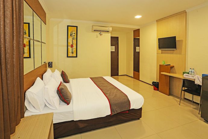 Imagen de la habitación del Hotel Super Oyo Townhouse Oak Fiducia Serpong, Kota Tangerang Selatan. Foto 11