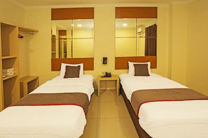 Imagen de la habitación del Hotel Super Oyo Townhouse Oak Fiducia Serpong, Kota Tangerang Selatan. Foto 12