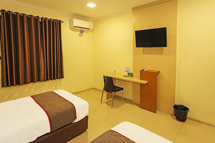 Imagen de la habitación del Hotel Super Oyo Townhouse Oak Fiducia Serpong, Kota Tangerang Selatan. Foto 14