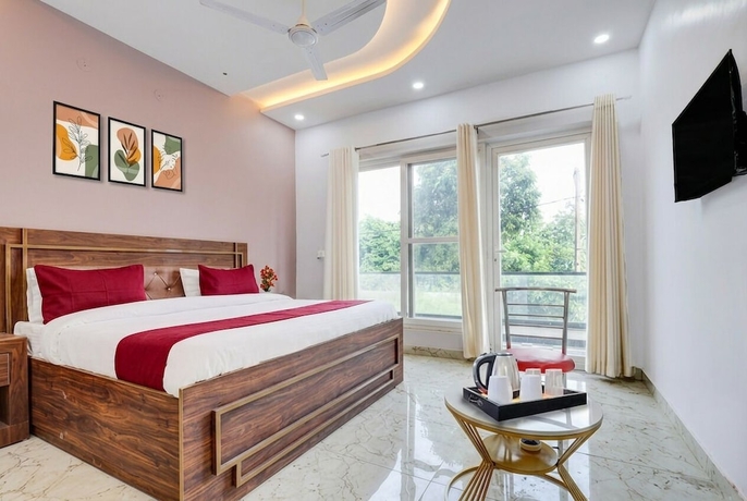 Imagen de la habitación del Hotel Super Pari Chowk Formerly The Divine KRC. Foto 3