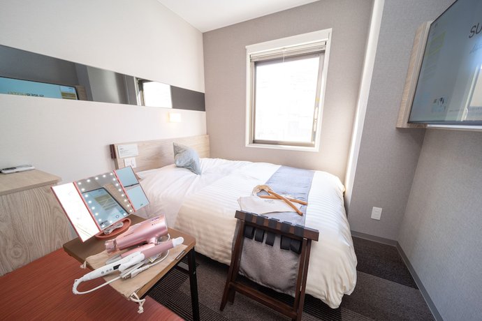Imagen de la habitación del Hotel Super Premier Miyazaki Ichibangai. Foto 16