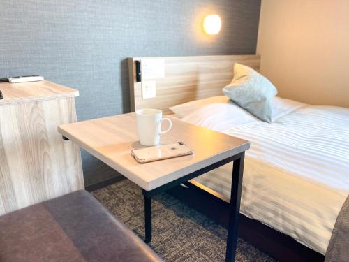 Imagen de la habitación del Hotel Super Premier Sendai Kokubuncho Tennenonsen. Foto 11