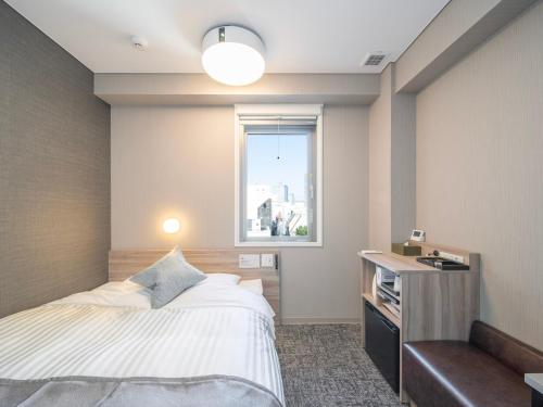 Imagen de la habitación del Hotel Super Premier Sendai Kokubuncho Tennenonsen. Foto 13