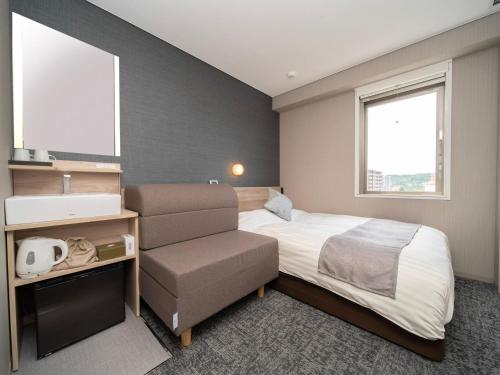 Imagen de la habitación del Hotel Super Premier Sendai Kokubuncho Tennenonsen. Foto 16