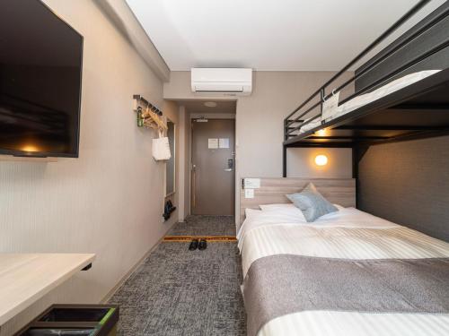 Imagen de la habitación del Hotel Super Premier Sendai Kokubuncho Tennenonsen. Foto 17