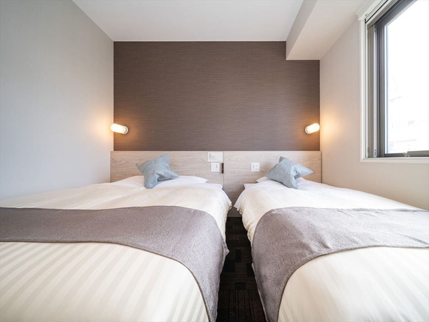 Imagen de la habitación del Hotel Super Sapporo Kitagojo Dori. Foto 16