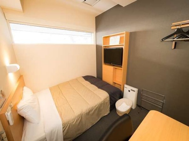 Imagen de la habitación del Hotel Super Takamatsu Tamachi. Foto 2