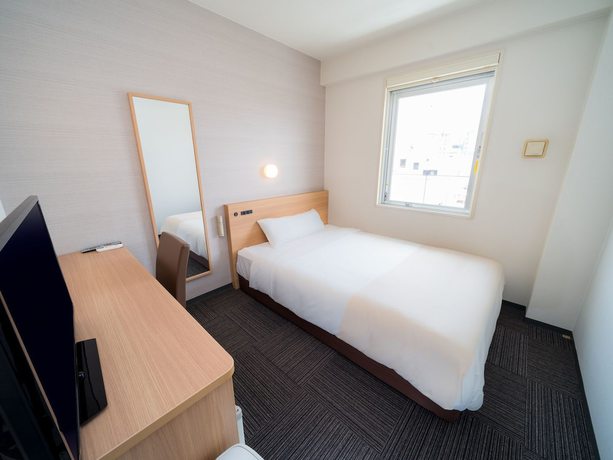 Imagen de la habitación del Hotel Super Takamatsu Tamachi. Foto 14
