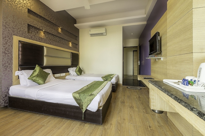 Imagen de la habitación del Hotel Super Townhouse Bani Park Formerly Aroma Residency. Foto 5