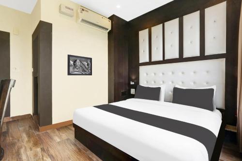Imagen de la habitación del Hotel Super Townhouse Dharamshala. Foto 19