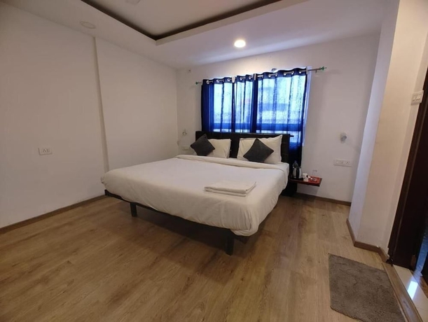 Imagen de la habitación del Hotel Super Townhouse Hatigaon Near Medicity Formerly Hotel Grand Majesty. Foto 6
