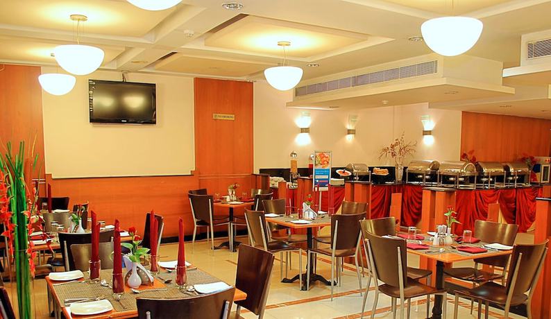 Imagen del bar/restaurante del Hotel Super Townhouse Koyambedu. Foto 2