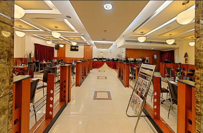 Imagen del bar/restaurante del Hotel Super Townhouse Koyambedu. Foto 3