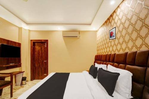 Imagen de la habitación del Hotel Super Townhouse OAK The Dev Regency. Foto 14