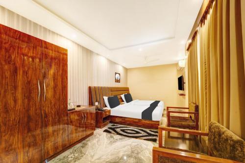 Imagen de la habitación del Hotel Super Townhouse OAK The Dev Regency. Foto 15