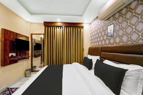 Imagen de la habitación del Hotel Super Townhouse OAK The Dev Regency. Foto 20