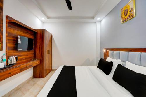 Imagen de la habitación del Hotel Super Townhouse Status By Sbg Near Anand Vihar Vaishali Metro Station. Foto 7