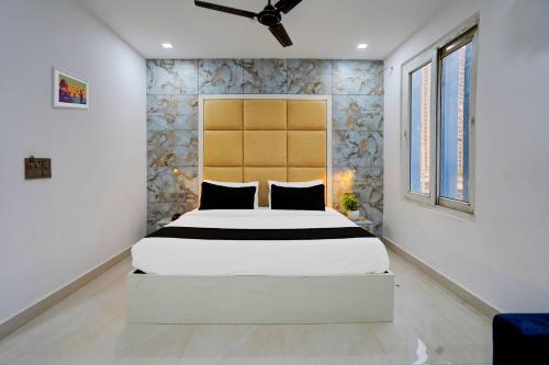 Imagen de la habitación del Hotel Super Townhouse Status By Sbg Near Anand Vihar Vaishali Metro Station. Foto 11