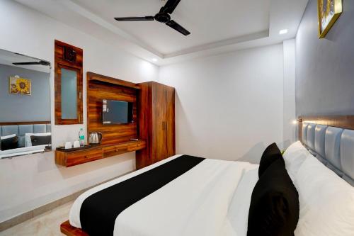 Imagen de la habitación del Hotel Super Townhouse Status By Sbg Near Anand Vihar Vaishali Metro Station. Foto 16