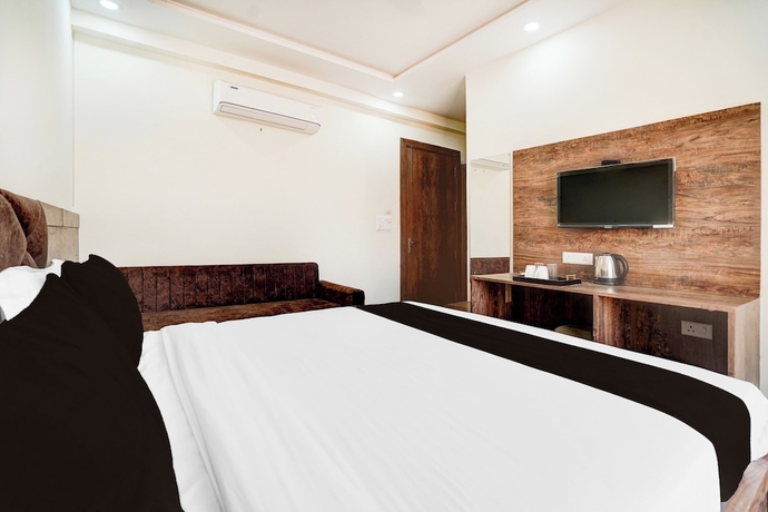 Imagen de la habitación del Hotel Super Townhouse Taj Mahal East Gate. Foto 6