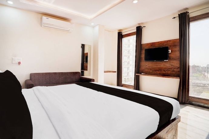 Imagen de la habitación del Hotel Super Townhouse Taj Mahal East Gate. Foto 8