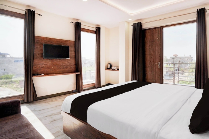 Imagen de la habitación del Hotel Super Townhouse Taj Mahal East Gate. Foto 9