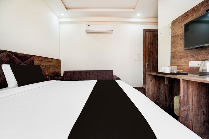 Imagen de la habitación del Hotel Super Townhouse Taj Mahal East Gate. Foto 10