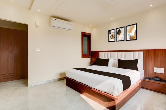 Imagen de la habitación del Hotel Super Townhouse Taj Nagri Phase 2. Foto 3