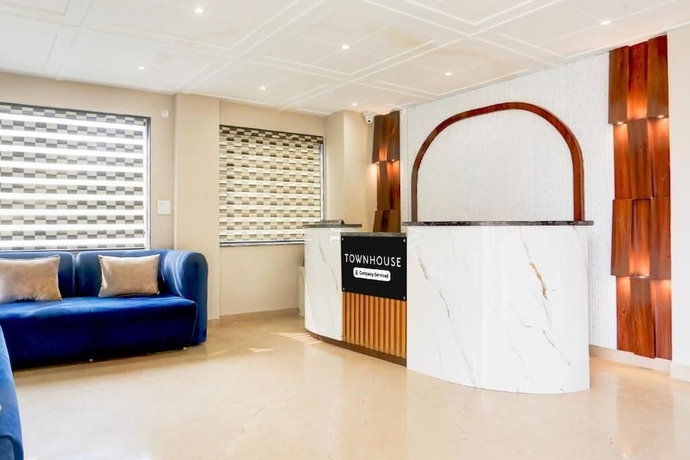 Imagen de los interiores del Hotel Super Townhouse Taj Nagri Phase 2. Foto 16