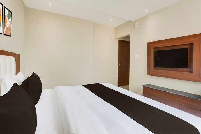 Imagen de la habitación del Hotel Super Townhouse Taj Nagri Phase 2. Foto 7