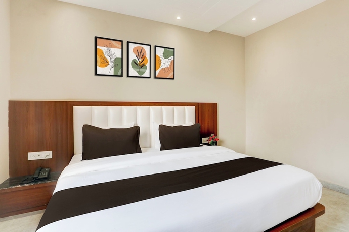 Imagen de la habitación del Hotel Super Townhouse Taj Nagri Phase 2. Foto 9