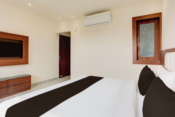 Imagen de la habitación del Hotel Super Townhouse Taj Nagri Phase 2. Foto 10