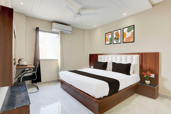Imagen de la habitación del Hotel Super Townhouse Taj Nagri Phase 2. Foto 11