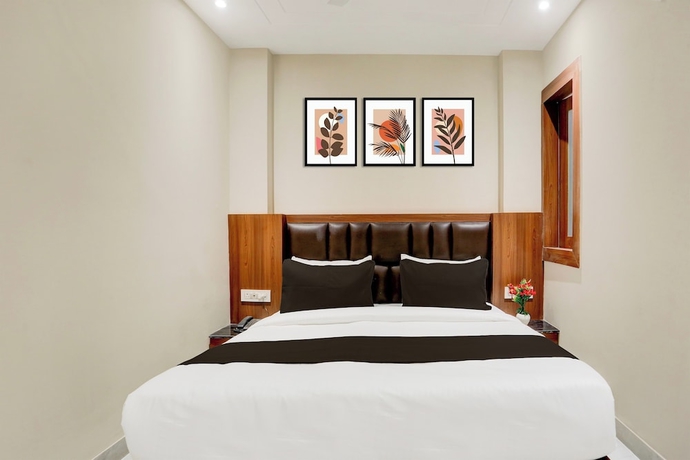 Imagen de la habitación del Hotel Super Townhouse Taj Nagri Phase 2. Foto 15