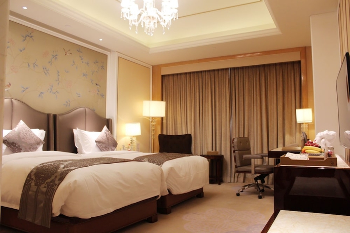 Imagen de la habitación del Hotel Suqian Hengli International. Foto 3
