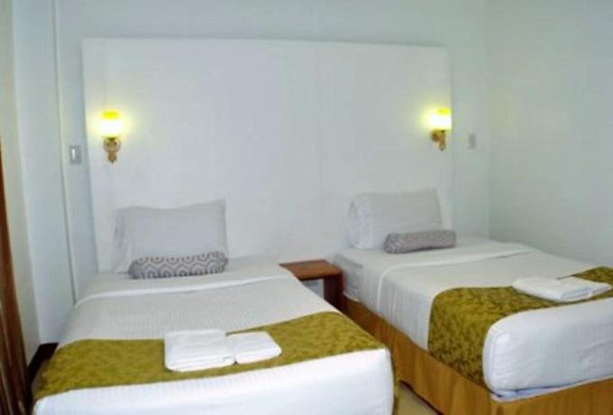 Imagen de la habitación del Hotel Sur Beach Resort. Foto 13